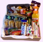 Deliver a hamper containing a selection of cheeses, muesli, coffee, tea, rusks, jams, bagels, yoghurt,
 muffins, juice and oats bars - click to enlarge